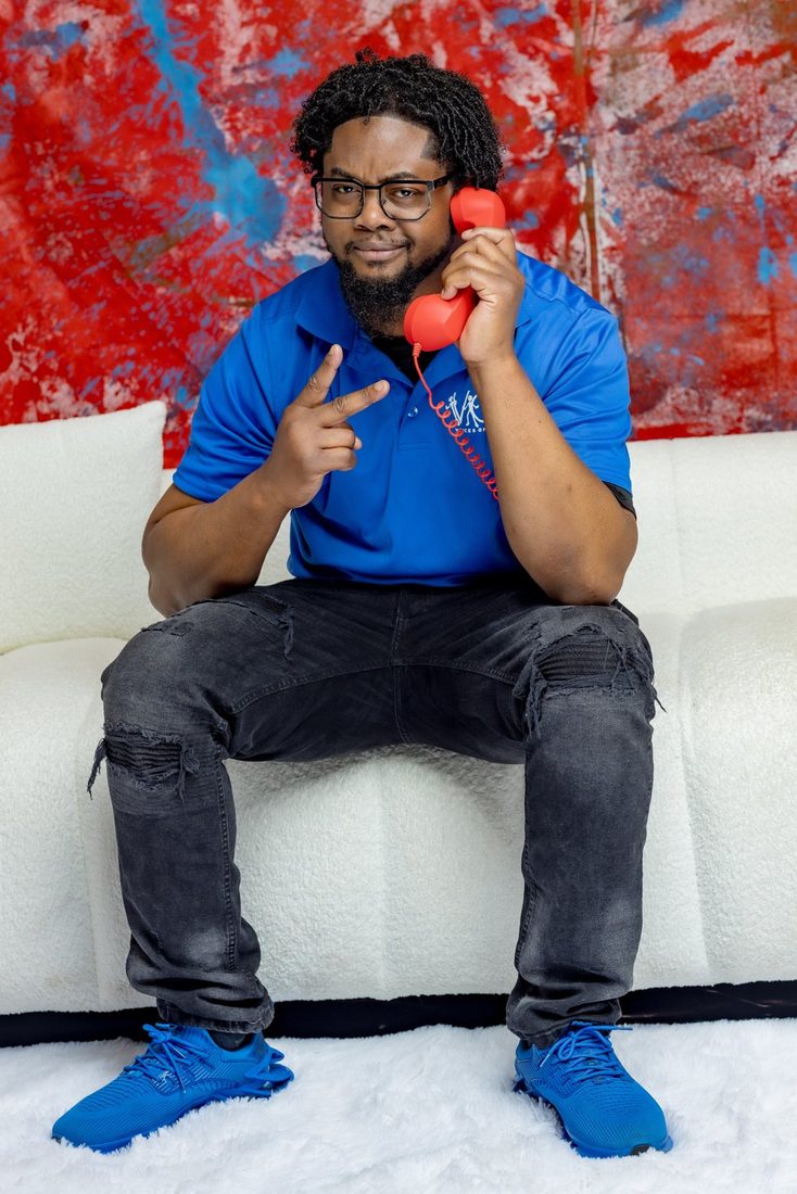 Model in the royal blue V.O.V polo