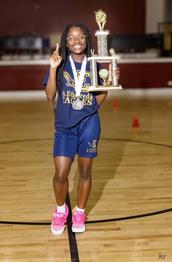 Fourth place trophy, first place smile
